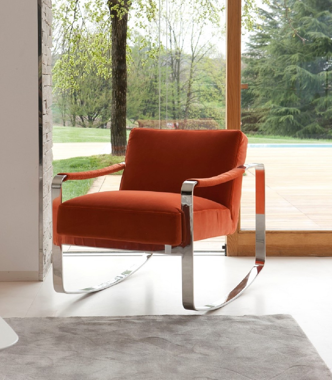 Petit fauteuil design méta & cuir à bascule cubique RON4